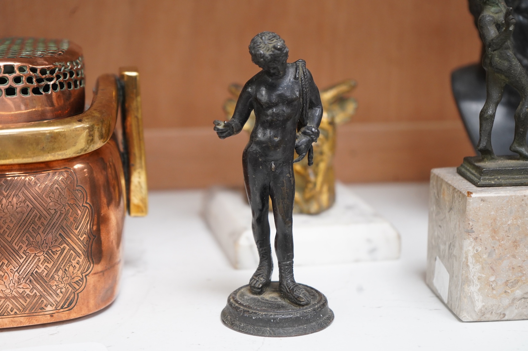 Italian grand tour souvenirs, 19th/20th century; nine small sculptures and busts, after the antique, the majority bronze and one depicting Lucius Verus, largest 19cm high